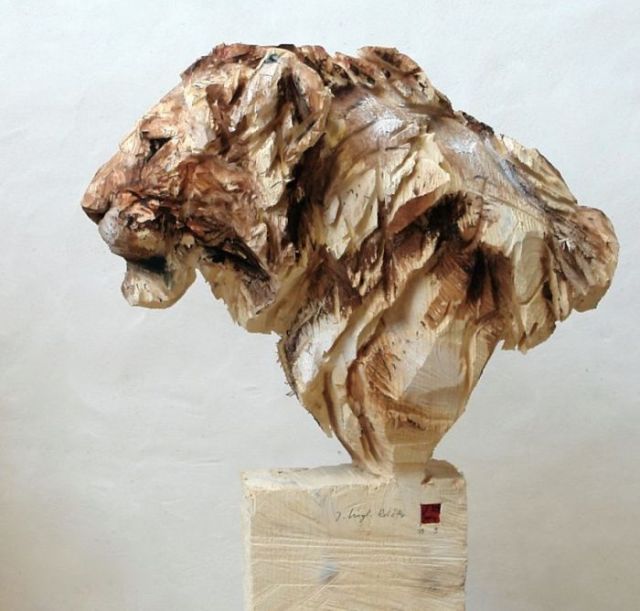 Artist Uses A Chainsaw To Carve Wood