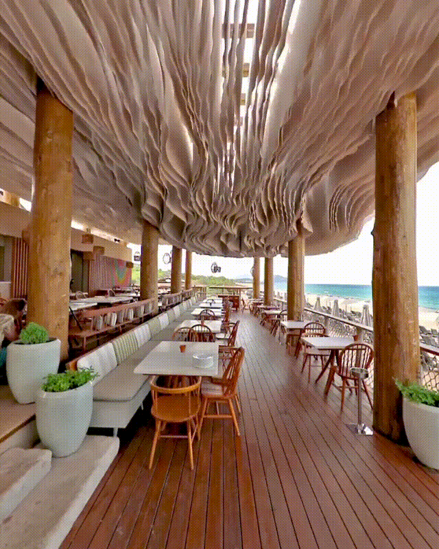Check Out What Happens When The Wind Hits The Ceiling Of This Beach Bar