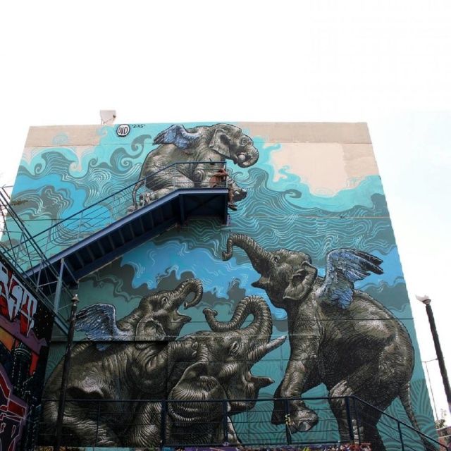 Artist Creates Large Scale Street Art Murals Across Europe
