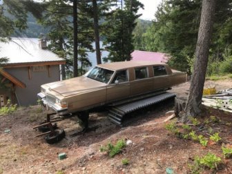 A Limousine On The Caterpillars And Skis