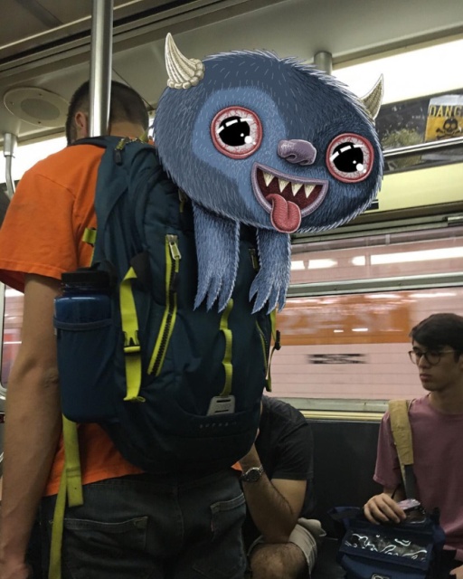 Artist Adds Monsters Next To Strangers On The Subway