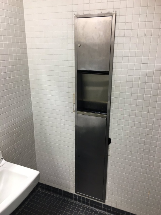 Danny DeVito Shrine Hidden Behind The Paper Towel Dispenser In One Of The School Bathrooms