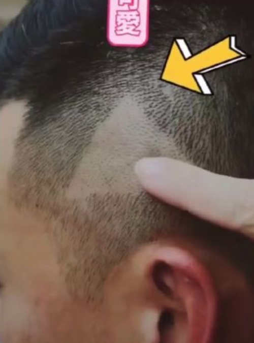 Chinese Man Gets Shaven 'Play' Icon After Showing Hairstylist Paused Video
