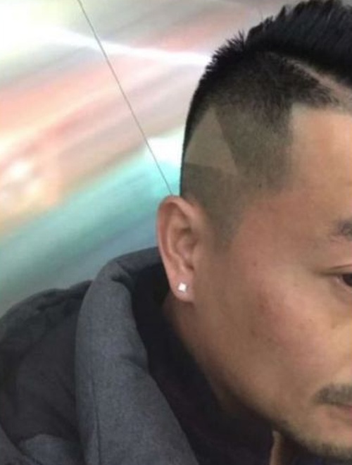 Chinese Man Gets Shaven 'Play' Icon After Showing Hairstylist Paused Video