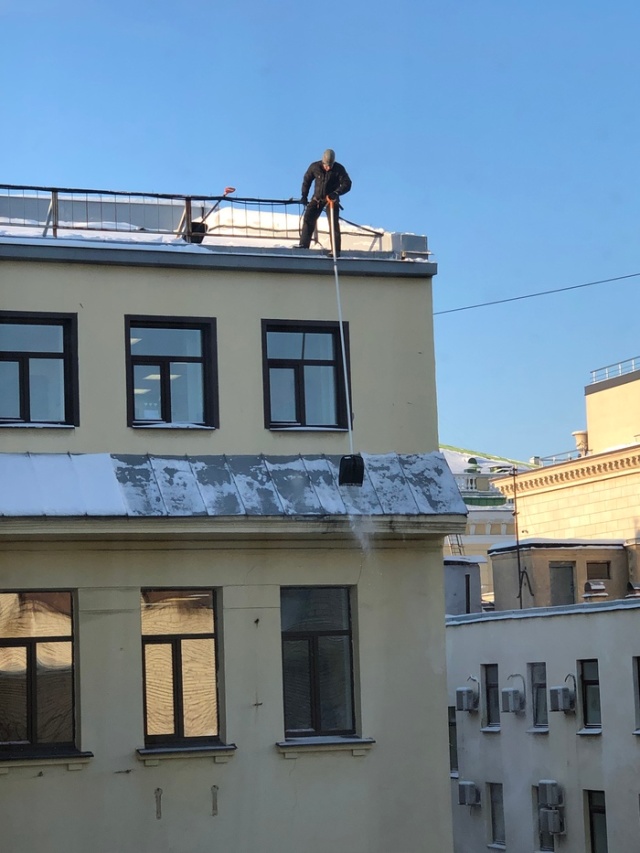 Snow Removal From Roofs In Russia