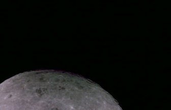The Far Side Of The Moon With Earth Sitting In The Distance