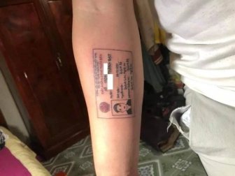 Guy Who Always Forgot His ID Card Has It Tattooed on Forearm