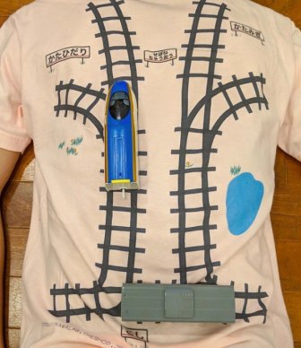 Japanese Dad Designs A T-Shirt With A Train Track So His Son Would Give Him A Massage While Playing