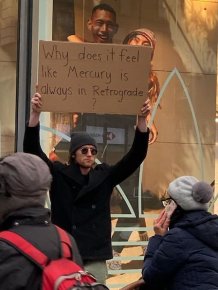 Guy With A Sign Shows Off Funny Statements