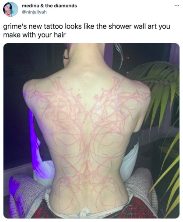 Internet Is Roasting Singer Grimes For 'Alien Scars' Tattoo
